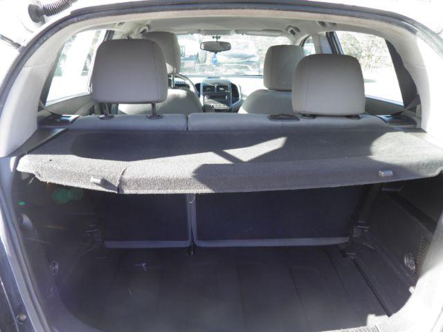 2014 Summit White Chevrolet Sonic LS Auto 5-Door (1G1JA6SG9E4) with an 1.8L L4 DOHC 24V engine, 6-Speed Automatic transmission, located at 19521 New George's Creek Rd SW, Barton, MD, 21521, (301) 463-2404, 39.524323, -79.017906 - Photo#4