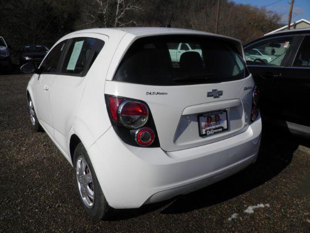 2014 Summit White Chevrolet Sonic LS Auto 5-Door (1G1JA6SG9E4) with an 1.8L L4 DOHC 24V engine, 6-Speed Automatic transmission, located at 19521 New George's Creek Rd SW, Barton, MD, 21521, (301) 463-2404, 39.524323, -79.017906 - Photo#5