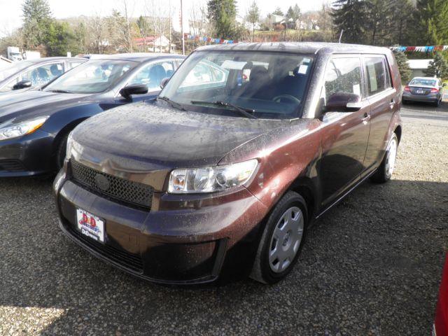 2009 Purple Scion xB Wagon (JTLKE50E091) with an 2.4/cly engine, 5SP transmission, located at 19521 New George's Creek Rd SW, Barton, MD, 21521, (301) 463-2404, 39.524323, -79.017906 - Photo #0
