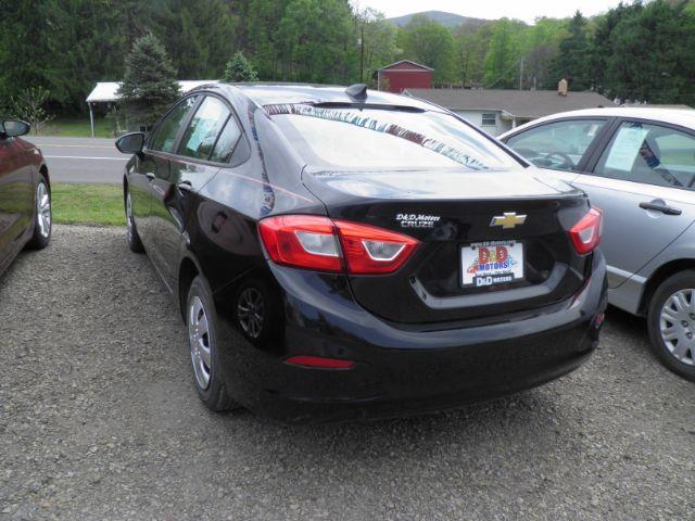 2017 BLACK Chevrolet Cruze LS Auto (1G1BC5SM1H7) with an 1.4l L4T engine, AT transmission, located at 19521 New George's Creek Rd SW, Barton, MD, 21521, (301) 463-2404, 39.524323, -79.017906 - Photo#4