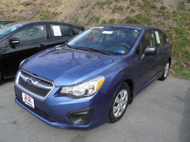 2014 BLUE SUBARU IMPREZA 4 DR (JF1GPAA65E8) with an 4 CYL engine, AT transmission, located at 15520 McMullen Hwy SW, Belair, MD, 21502, (301) 729-3700, 39.581375, -78.846451 - Photo #0