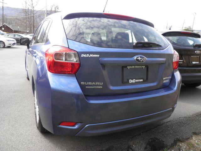2014 BLUE SUBARU IMPREZA 4 DR (JF1GPAA65E8) with an 4 CYL engine, AT transmission, located at 15520 McMullen Hwy SW, Belair, MD, 21502, (301) 729-3700, 39.581375, -78.846451 - Photo #5