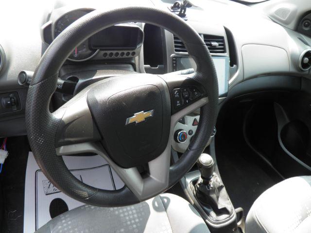2014 RED Chevrolet Sonic LS Manual Sedan (1G1JB5SH5E4) with an 1.8l L4 engine, 5SP transmission, located at 19521 New George's Creek Rd SW, Barton, MD, 21521, (301) 463-2404, 39.524323, -79.017906 - Photo#2