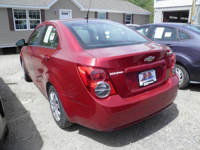 2014 RED Chevrolet Sonic LS Manual Sedan (1G1JB5SH5E4) with an 1.8l L4 engine, 5SP transmission, located at 19521 New George's Creek Rd SW, Barton, MD, 21521, (301) 463-2404, 39.524323, -79.017906 - Photo #4