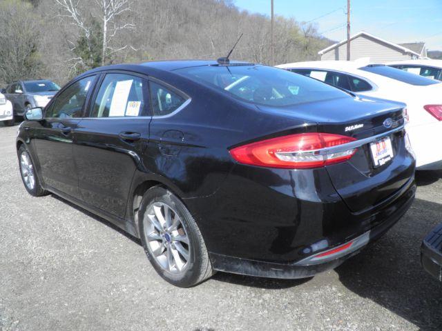 2017 BLACK Ford Fusion SE (3FA6P0H70HR) with an 2.5L L4 engine, AT transmission, located at 19521 New George's Creek Rd SW, Barton, MD, 21521, (301) 463-2404, 39.524323, -79.017906 - Photo #4