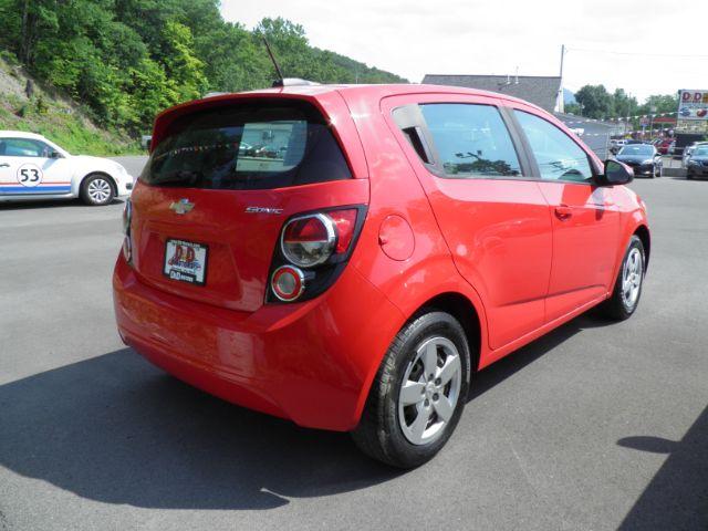 2015 RED Chevrolet Sonic LS Auto 5-Door (1G1JA6SG8F4) with an 1.8l L4 engine, AT transmission, located at 19521 New George's Creek Rd SW, Barton, MD, 21521, (301) 463-2404, 39.524323, -79.017906 - Photo #4