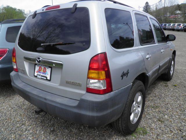 2001 SILVER Mazda Tribute DX V6 4WD (4F2YU06161K) with an 3.0 V6 engine, AT transmission, located at 19521 New George's Creek Rd SW, Barton, MD, 21521, (301) 463-2404, 39.524323, -79.017906 - Photo #4