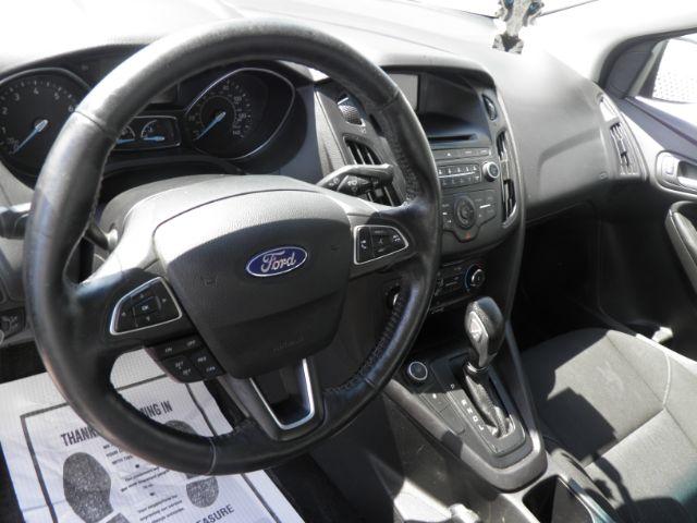 2017 White Ford Focus SE Sedan (1FADP3F25HL) with an 2.4L I4 engine, AT transmission, located at 15520 McMullen Hwy SW, Belair, MD, 21502, (301) 729-3700, 39.581375, -78.846451 - Photo#2