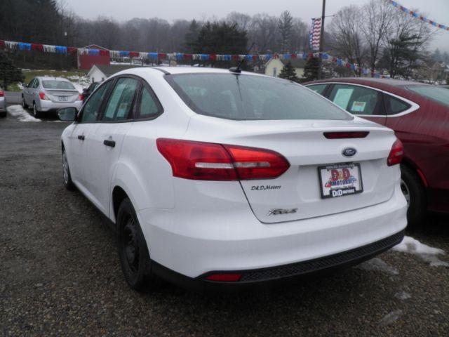 2016 WHITE Ford Focus S Sedan (1FADP3E24GL) with an 2.0L L4 engine, AT transmission, located at 19521 New George's Creek Rd SW, Barton, MD, 21521, (301) 463-2404, 39.524323, -79.017906 - Photo #4
