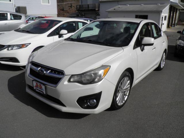 2012 WHITE Subaru Impreza Limited 4-Door (JF1GJAG63CH) with an 2.0L L4 engine, AT transmission, located at 15520 McMullen Hwy SW, Belair, MD, 21502, (301) 729-3700, 39.581375, -78.846451 - Photo #0