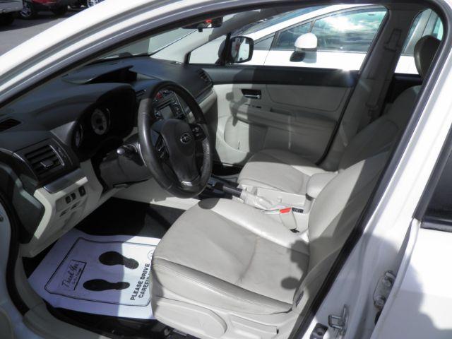 2012 WHITE Subaru Impreza Limited 4-Door (JF1GJAG63CH) with an 2.0L L4 engine, AT transmission, located at 15520 McMullen Hwy SW, Belair, MD, 21502, (301) 729-3700, 39.581375, -78.846451 - Photo #1