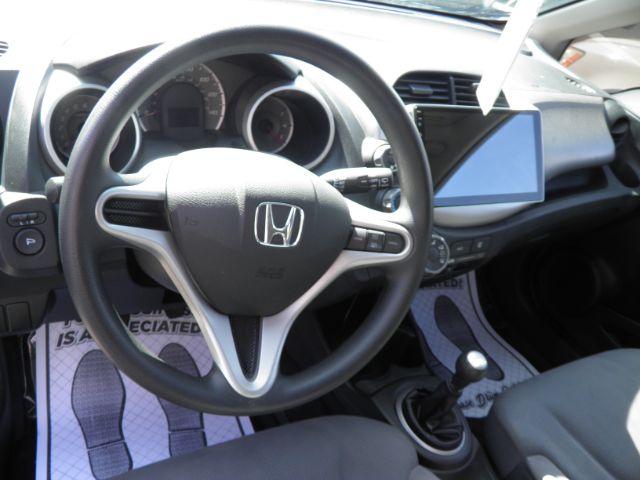 2013 BLUE Honda Fit 5-Speed MT (JHMGE8G33DC) with an 1.5L L4 engine, 5SP transmission, located at 15520 McMullen Hwy SW, Belair, MD, 21502, (301) 729-3700, 39.581375, -78.846451 - Photo #2