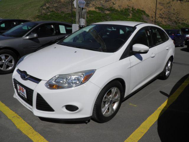 2014 WHITE Ford Focus SE Sedan (1FADP3F26EL) with an 2.0L L4 engine, located at 15520 McMullen Hwy SW, Belair, MD, 21502, (301) 729-3700, 39.581375, -78.846451 - Photo #0