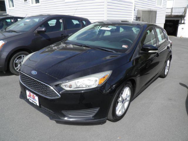 2016 BLACK Ford Focus SE Hatch (1FADP3K29GL) with an 2.0L L4 engine, located at 19521 New George's Creek Rd SW, Barton, MD, 21521, (301) 463-2404, 39.524323, -79.017906 - Photo #0