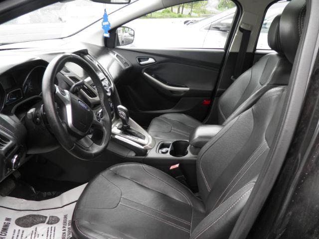 2012 Black Ford Focus SEL Sedan (1FAHP3H2XCL) with an 2.0L I4 engine, AT transmission, located at 19521 New George's Creek Rd SW, Barton, MD, 21521, (301) 463-2404, 39.524323, -79.017906 - Photo#1