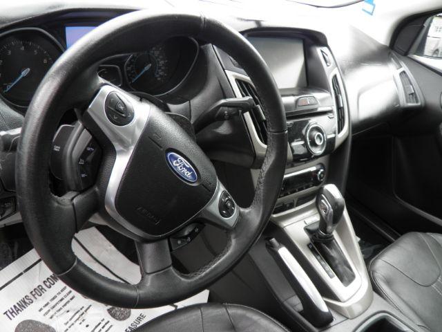 2012 Black Ford Focus SEL Sedan (1FAHP3H2XCL) with an 2.0L I4 engine, AT transmission, located at 19521 New George's Creek Rd SW, Barton, MD, 21521, (301) 463-2404, 39.524323, -79.017906 - Photo#2