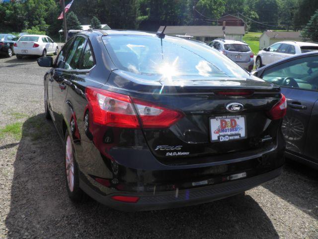 2012 BLACK Ford Focus SEL Sedan (1FAHP3H2XCL) with an 2.0L L4 engine, AT transmission, located at 19521 New George's Creek Rd SW, Barton, MD, 21521, (301) 463-2404, 39.524323, -79.017906 - Photo#4