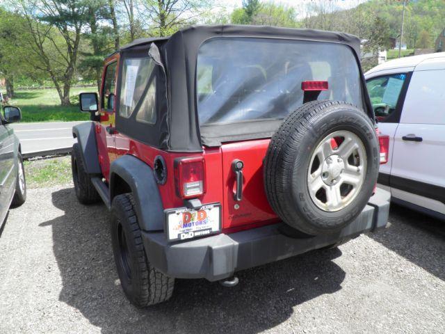 2011 RED Jeep Wrangler Sport 4WD (1J4AA2D14BL) with an 3.8 V6 engine, AT transmission, located at 19521 New George's Creek Rd SW, Barton, MD, 21521, (301) 463-2404, 39.524323, -79.017906 - Photo #4