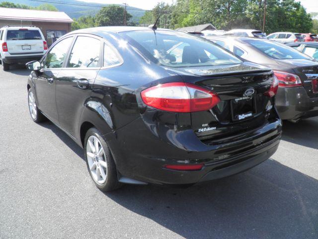 2019 BLACK Ford Fiesta SE Sedan (3FADP4BJ1KM) with an 1.6L L4 engine, AT transmission, located at 19521 New George's Creek Rd SW, Barton, MD, 21521, (301) 463-2404, 39.524323, -79.017906 - Photo#4