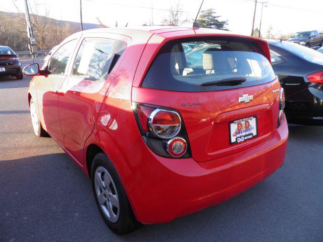 2016 RED Chevrolet SONIC LS Auto 5-Door (1G1JA6SG9G4) with an 1.8L L4 engine, AT transmission, located at 15520 McMullen Hwy SW, Belair, MD, 21502, (301) 729-3700, 39.581375, -78.846451 - Photo#5