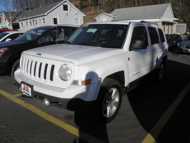 2014 WHITE Jeep Patriot Limited 4WD (1C4NJRCB2ED) with an 2.4L L4 engine, located at 15520 McMullen Hwy SW, Belair, MD, 21502, (301) 729-3700, 39.581375, -78.846451 - Photo#0