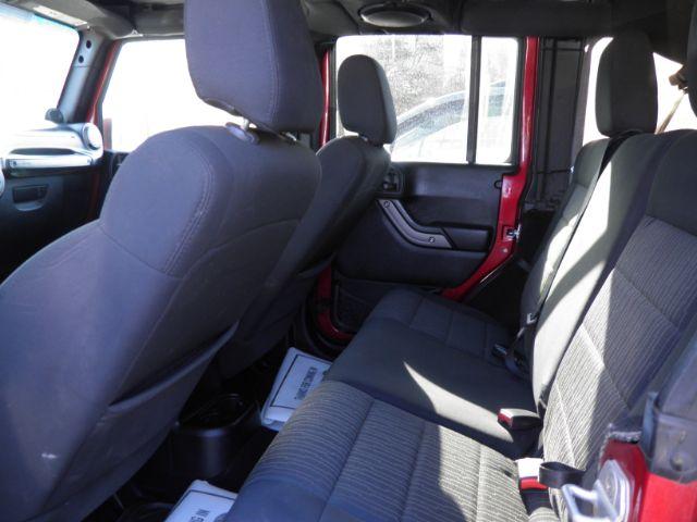 2012 RED Jeep Wrangler Unlimited Sport 4WD (1C4BJWDG6CL) with an 3.6L V6 engine, 6SP transmission, located at 19521 New George's Creek Rd SW, Barton, MD, 21521, (301) 463-2404, 39.524323, -79.017906 - Photo#3