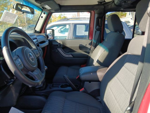 2012 RED Jeep Wrangler Unlimited Sport 4WD (1C4BJWDG6CL) with an 3.6L V6 engine, 6SP transmission, located at 15520 McMullen Hwy SW, Belair, MD, 21502, (301) 729-3700, 39.581375, -78.846451 - Photo#1