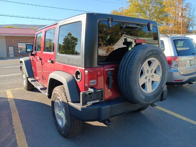 2012 RED Jeep Wrangler Unlimited Sport 4WD (1C4BJWDG6CL) with an 3.6L V6 engine, 6SP transmission, located at 15520 McMullen Hwy SW, Belair, MD, 21502, (301) 729-3700, 39.581375, -78.846451 - Photo#4