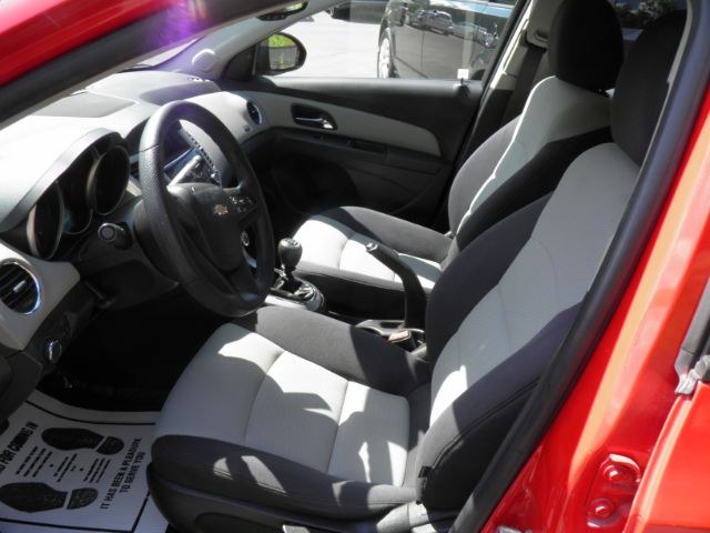 2015 Red Chevrolet Cruze LS Manual (1G1PB5SG9F7) with an 1.8L I4 engine, 6SP transmission, located at 15520 McMullen Hwy SW, Belair, MD, 21502, (301) 729-3700, 39.581375, -78.846451 - Photo#1