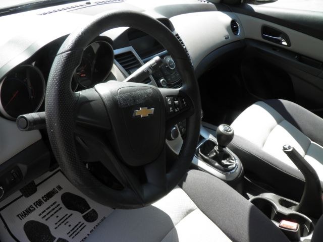 2015 Red Chevrolet Cruze LS Manual (1G1PB5SG9F7) with an 1.8L I4 engine, 6SP transmission, located at 15520 McMullen Hwy SW, Belair, MD, 21502, (301) 729-3700, 39.581375, -78.846451 - Photo#2