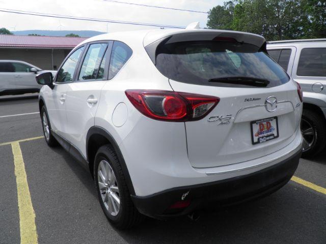 2013 White Mazda CX-5 Sport (JM3KE4BE4D0) with an 2.4L I4 engine, AT transmission, located at 15520 McMullen Hwy SW, Belair, MD, 21502, (301) 729-3700, 39.581375, -78.846451 - Photo#5