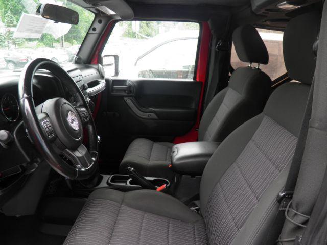 2011 RED Jeep Wrangler Sport (1J4AA2D16BL) with an 3.8 V6 engine, 6SP transmission, located at 19521 New George's Creek Rd SW, Barton, MD, 21521, (301) 463-2404, 39.524323, -79.017906 - Photo#1