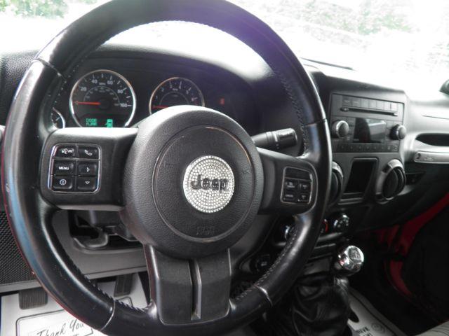 2011 RED Jeep Wrangler Sport (1J4AA2D16BL) with an 3.8 V6 engine, 6SP transmission, located at 19521 New George's Creek Rd SW, Barton, MD, 21521, (301) 463-2404, 39.524323, -79.017906 - Photo#2
