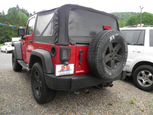 2011 RED Jeep Wrangler Sport (1J4AA2D16BL) with an 3.8 V6 engine, 6SP transmission, located at 19521 New George's Creek Rd SW, Barton, MD, 21521, (301) 463-2404, 39.524323, -79.017906 - Photo#4