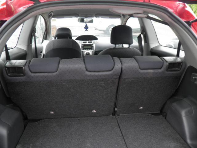 2011 RED Toyota Yaris BASE (JTDJT4K30B5) with an 2.4L L4 engine, located at 19521 New George's Creek Rd SW, Barton, MD, 21521, (301) 463-2404, 39.524323, -79.017906 - Photo#4