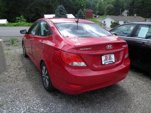 2017 Red Hyundai Accent Value Edition (KMHCT4AEXHU) with an 1.6L I4 engine, located at 19521 New George's Creek Rd SW, Barton, MD, 21521, (301) 463-2404, 39.524323, -79.017906 - Photo#4