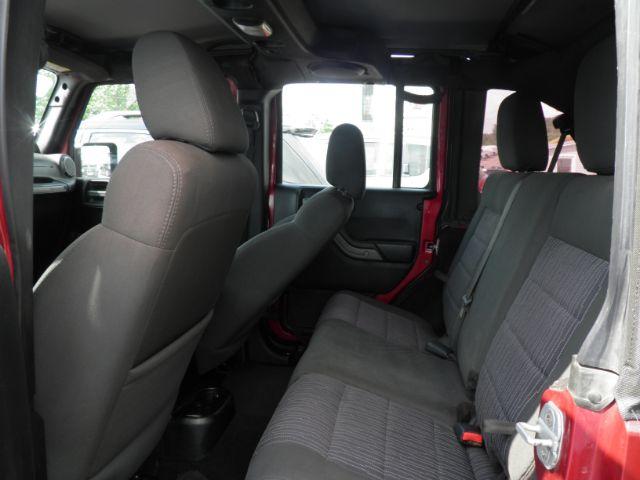 2011 RED Jeep Wrangler Unlimited Sport 4WD (1J4BA3H11BL) with an 3.8 V6 engine, AT transmission, located at 15520 McMullen Hwy SW, Belair, MD, 21502, (301) 729-3700, 39.581375, -78.846451 - Photo#3