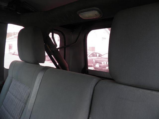 2011 RED Jeep Wrangler Unlimited Sport 4WD (1J4BA3H11BL) with an 3.8 V6 engine, AT transmission, located at 15520 McMullen Hwy SW, Belair, MD, 21502, (301) 729-3700, 39.581375, -78.846451 - Photo#4