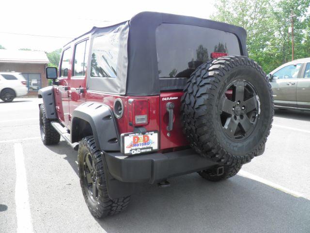 2011 RED Jeep Wrangler Unlimited Sport 4WD (1J4BA3H11BL) with an 3.8 V6 engine, AT transmission, located at 15520 McMullen Hwy SW, Belair, MD, 21502, (301) 729-3700, 39.581375, -78.846451 - Photo#6
