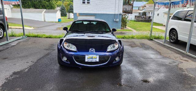 2010 Blue /Cloth Mazda MX-5 Miata Grand Touring PRHT (JM1NC2FF3A0) with an 2.0l L4 engine, AT transmission, located at 15520 McMullen Hwy SW, Belair, MD, 21502, (301) 729-3700, 39.581375, -78.846451 - FOR A BETTER PRICE CALL PAUL AT 301-268-8150 - Photo#1