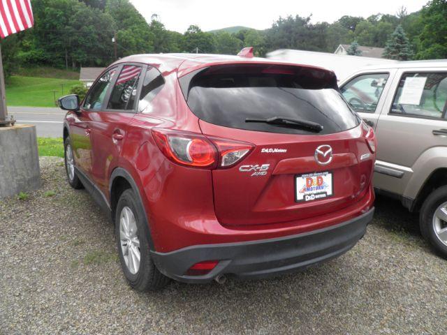 2013 RED Mazda CX-5 Touring (JM3KE4CE4D0) with an 2.4L L4 engine, located at 19521 New George's Creek Rd SW, Barton, MD, 21521, (301) 463-2404, 39.524323, -79.017906 - Photo#5