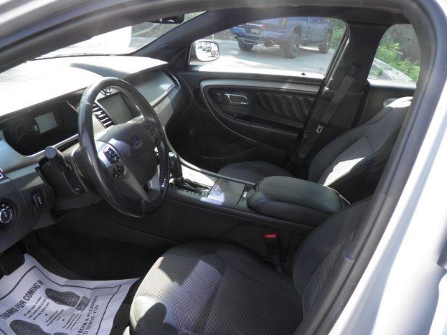2015 Silver Ford Taurus SEL (1FAHP2H83FG) with an 3.5L V6 engine, AT transmission, located at 15520 McMullen Hwy SW, Belair, MD, 21502, (301) 729-3700, 39.581375, -78.846451 - Photo#1