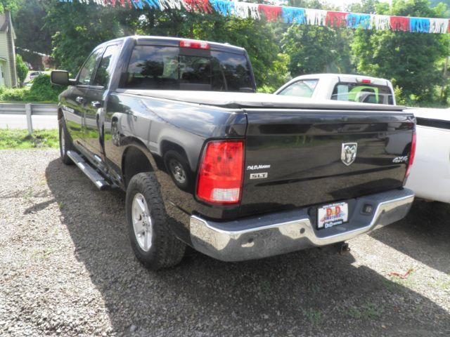 2011 Black RAM 1500 SLT Quad Cab 4WD (1D7RV1GTXBS) with an 5.7L V8 engine, AT transmission, located at 15520 McMullen Hwy SW, Belair, MD, 21502, (301) 729-3700, 39.581375, -78.846451 - Photo#4