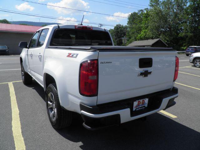 2016 White Chevrolet Colorado Z71 (1GCGTDE37G1) with an 3.6L V6 engine, AT transmission, located at 15520 McMullen Hwy SW, Belair, MD, 21502, (301) 729-3700, 39.581375, -78.846451 - Photo#4