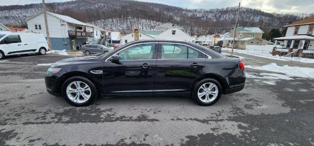 2016 Black /Cloth Ford Taurus SE (1FAHP2D81GG) with an 3.5L V6 engine, AT transmission, located at 15520 McMullen Hwy SW, Belair, MD, 21502, (301) 729-3700, 39.581375, -78.846451 - FOR A BETTER PRICE CALL PAUL AT 301-268-8150 - Photo#3
