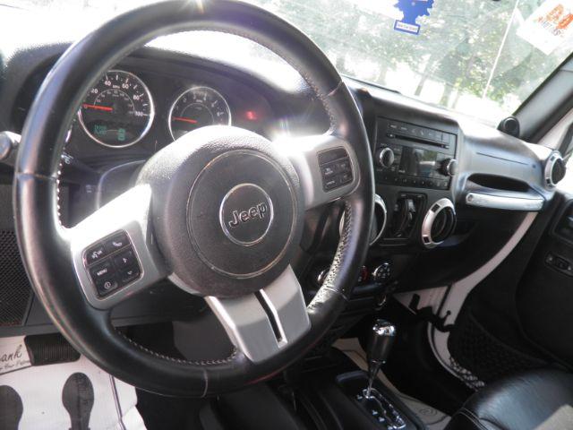 2013 White Jeep Wrangler Unlimited Freedom Edition (1C4BJWDG2DL) with an 3.6L V6 engine, AT transmission, located at 15520 McMullen Hwy SW, Belair, MD, 21502, (301) 729-3700, 39.581375, -78.846451 - Photo#2