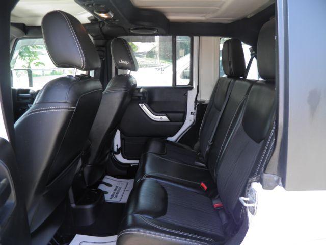 2013 White Jeep Wrangler Unlimited Freedom Edition (1C4BJWDG2DL) with an 3.6L V6 engine, AT transmission, located at 15520 McMullen Hwy SW, Belair, MD, 21502, (301) 729-3700, 39.581375, -78.846451 - Photo#4
