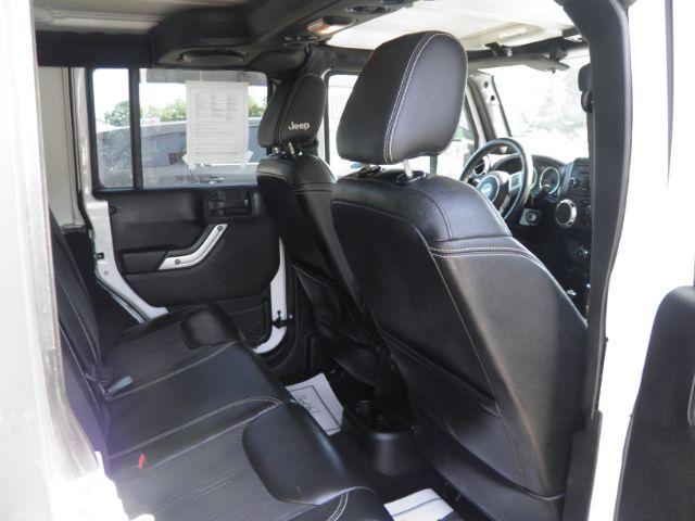 2013 White Jeep Wrangler Unlimited Freedom Edition (1C4BJWDG2DL) with an 3.6L V6 engine, AT transmission, located at 15520 McMullen Hwy SW, Belair, MD, 21502, (301) 729-3700, 39.581375, -78.846451 - Photo#5