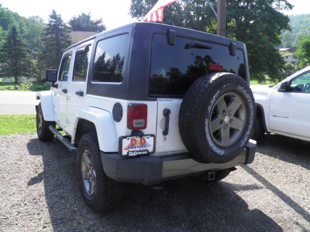2013 White Jeep Wrangler Unlimited Freedom Edition (1C4BJWDG2DL) with an 3.6L V6 engine, AT transmission, located at 15520 McMullen Hwy SW, Belair, MD, 21502, (301) 729-3700, 39.581375, -78.846451 - Photo#7