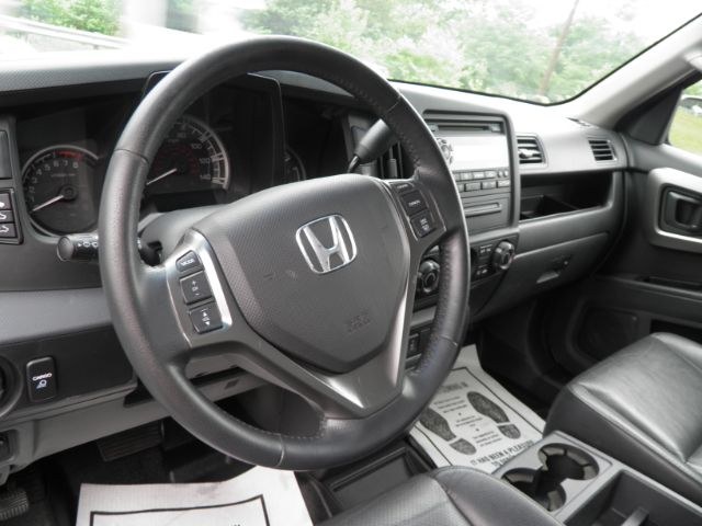 2011 Gray Honda Ridgeline RTL (5FPYK1F51BB) with an 3.5L V6 engine, AT transmission, located at 15520 McMullen Hwy SW, Belair, MD, 21502, (301) 729-3700, 39.581375, -78.846451 - Photo#2